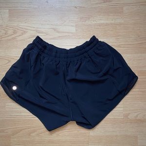size 8 black lululemon hotty hot shorts 4 inch